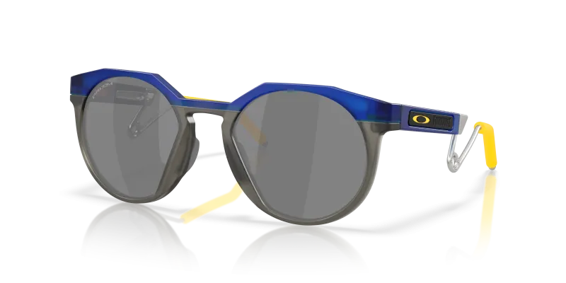 แว่นกันแดด Oakley HSTN Metal OO9279-06 Trans Crystal Blue Prizm Black แว่นกันแดด Oakley OO9279-06 มุมเฉียง สีน้ำเงินคริสตัลโปร่งใส สำหรับผู้ใช้ทุกเพศ