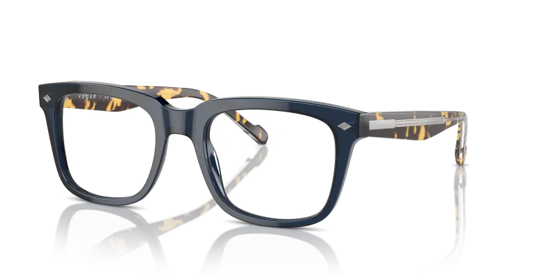 กรอบแว่นสายตา Vogue VO5572-3143 Transparent Blue Vogue VO5572 3143 แว่นสายตาสีน้ำเงินโปร่งใส ทรงหมอน ผู้ชาย