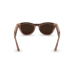 Rear view of Rayban Meta Skyler glasses with Shiny Transparent Peach frames with Brown Transitions® lenses.